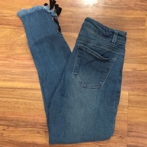 Skinny Jeans with Distressed Bottoms